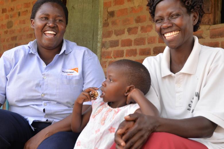World Vision staff and mum laughing