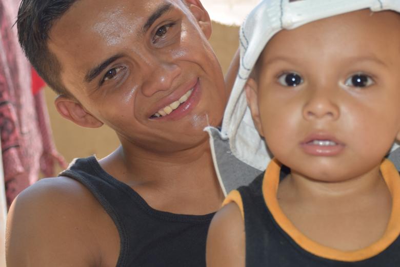 Zika survivor Bryon Carranza and his son, Andrew