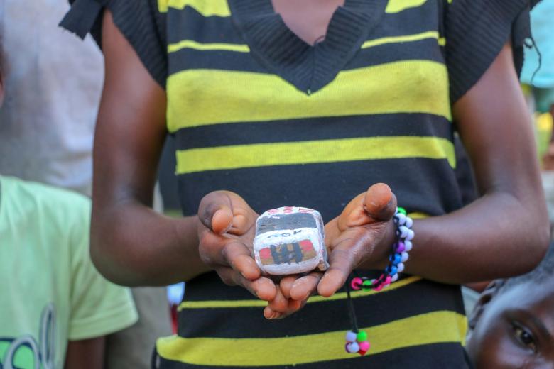 Children at Child Friendly Spaces learn local handicrafts as a form of art therapy