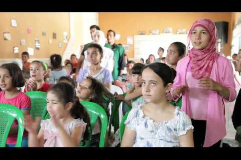 Drawing smiles on the faces Syrian refugee children in Lebanon