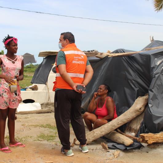 World Vision team interviewing migrant families stranded in Necoclí