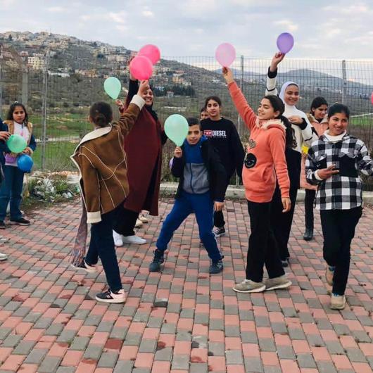 Group of children taking part in a MHPSS activity in the north of the West Bank