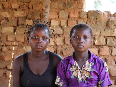 Sisters Mputu, 15, and Bakandi, 11 recently arrived in Dibaya. They grew up over 500km away, near Tshikapa in Kasai province, where the conflict turned their lives upside down this spring Sisters Mputu, 15, and Bakandi, 11 recently arrived in Dibaya. They grew up over 500km away, near Tshikapa in Kasai province, where the conflict turned their lives upside down this spring