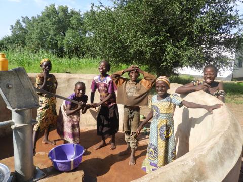 the students of the official school of MangaDomgo receiving their water point.JPG