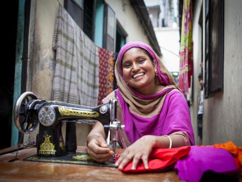 A woman with a sewing machine