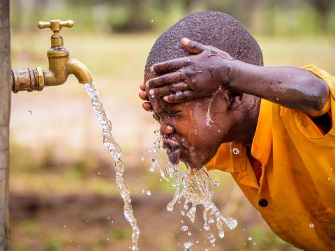 A child enjoys clean water
