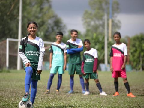 Cambodian children playing soccer