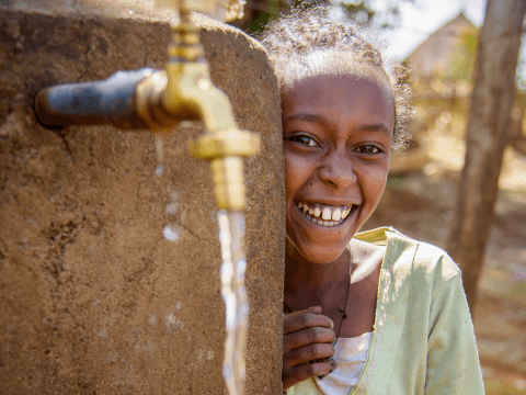 Girls with running clean water