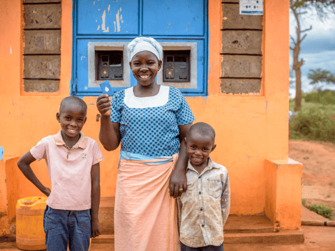 Mother with two children Grundfos Wrold Vision Partnership
