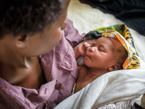 Mother breastfeeding infant