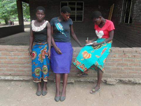 Dorthy, in red Blouse, in company of her friends