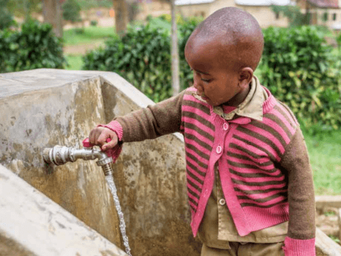 Child with clean running water