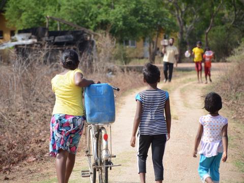 Children on their way to get water