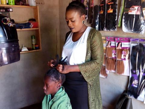 Catherine working in her salon shop