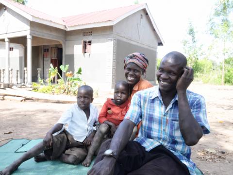 David Ewayu family: Beside David having the first congregated iron roofed house, he installed solar power system to provide lighting for his children to read and do their homework at night.