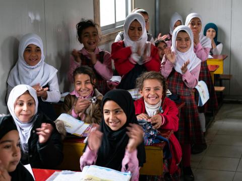 Girls clapping in a Child Friendly Space in Iraq