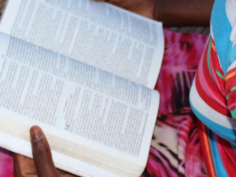 Joaninha reading Scriptures 