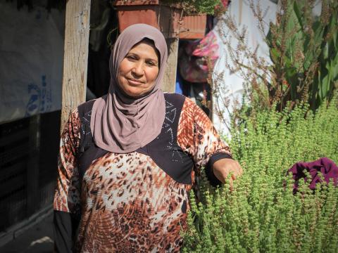 Mariam in fron of her tent