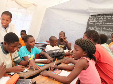 pupils paying attention on teacher's explanation