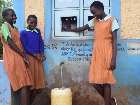 Children at a water point in Wema, Nakuru County located in Kenya. ©World Vision Photo/By Sarah Ooko