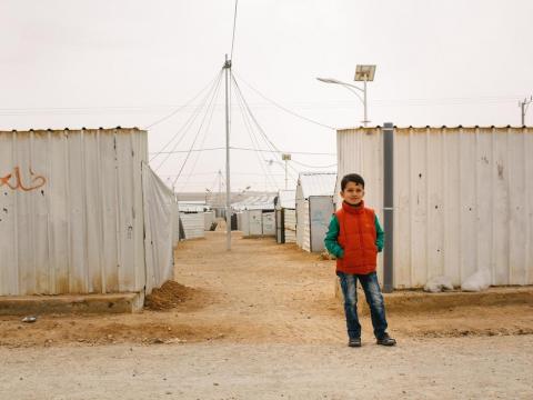Syrian refugee boy in camp in Jordan