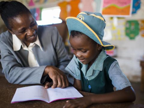 Teacher and child reading