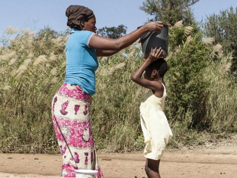 So many mothers in Zimbabwe and around the world live - and dream - for others. Carolina Varela/World Vision