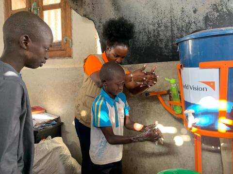 Antoinette Habinshuti, World Vision Senegal National Director doing handwashing lesson with children