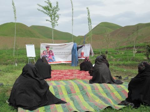 Women participate kitchen gardening and covid-19 training.