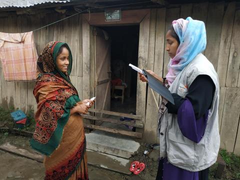 Beneficiary registering for cash assistance after floods affecting Bandarban, Bangladesh