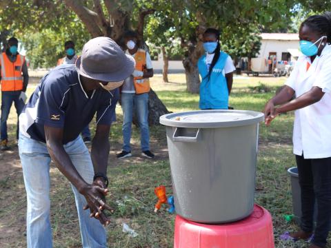 Cyclone Idai survivors learning a proper handwashing to preven COVID-19