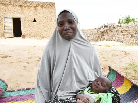 Zeinabou holding her son Imrane