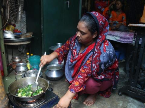 Families receive cash support from the distribution centre of World Vision in Bangladesh