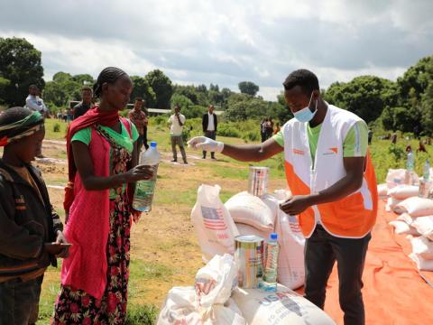 World Vision staff distributes food in Ethiopia