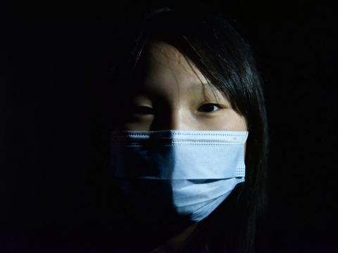 Mongolia girl with face mask