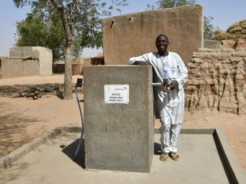 Yahouza 42 years old, near a pump done in his community