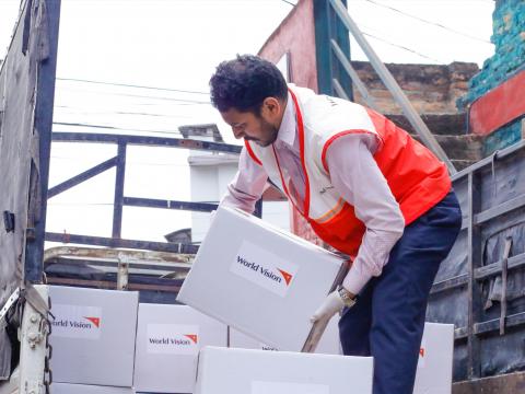 WVI Nepal staff uploads the PPE and Hygiene Kits to be handed over to the Ministry of Health and Population on April 22, 2020.