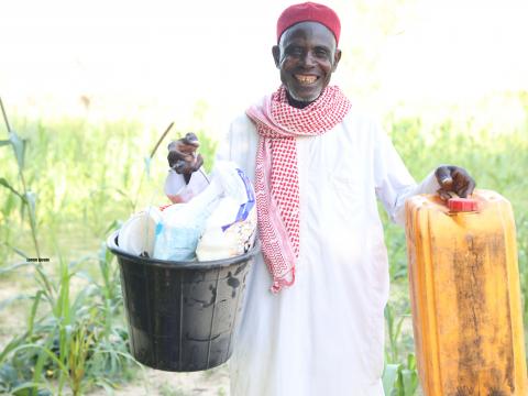 elhaj katchalla with the materials he received from WV