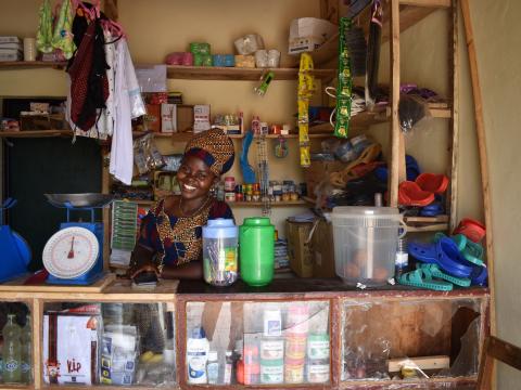 Josiane happily waiting for clients in her shop