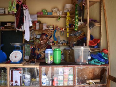 Josiane happily waiting for clients in her shop
