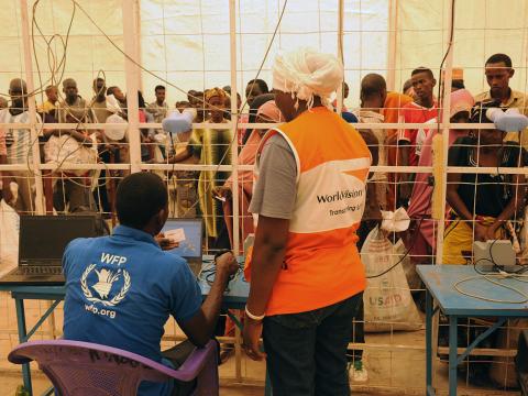 World Vision and WFP staff at a distribution