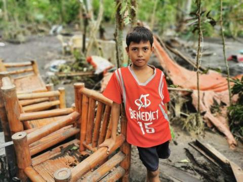 11-year-old Mico's home was buried in mud after Typhoon Goni