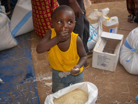 Child eating food from a bag