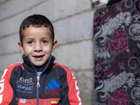 Baraa, four-year-old Syrian refugee boy, enrolled in remote early childhood education session with WVL in Bekaa 