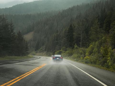 Tesla driving on wet road