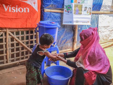 Child washing hands in Nepal