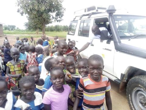 Kenneth Playing with the children