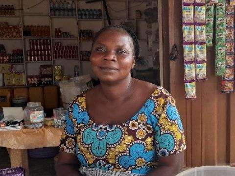 Vivian in front of her store 