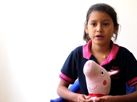 Reishell fled Venezuela for Ecuador with her Peppa Pig toy