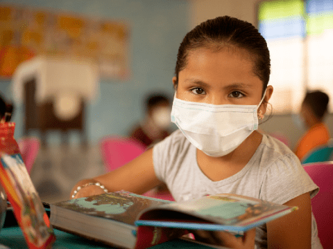 Child in mask in Chile